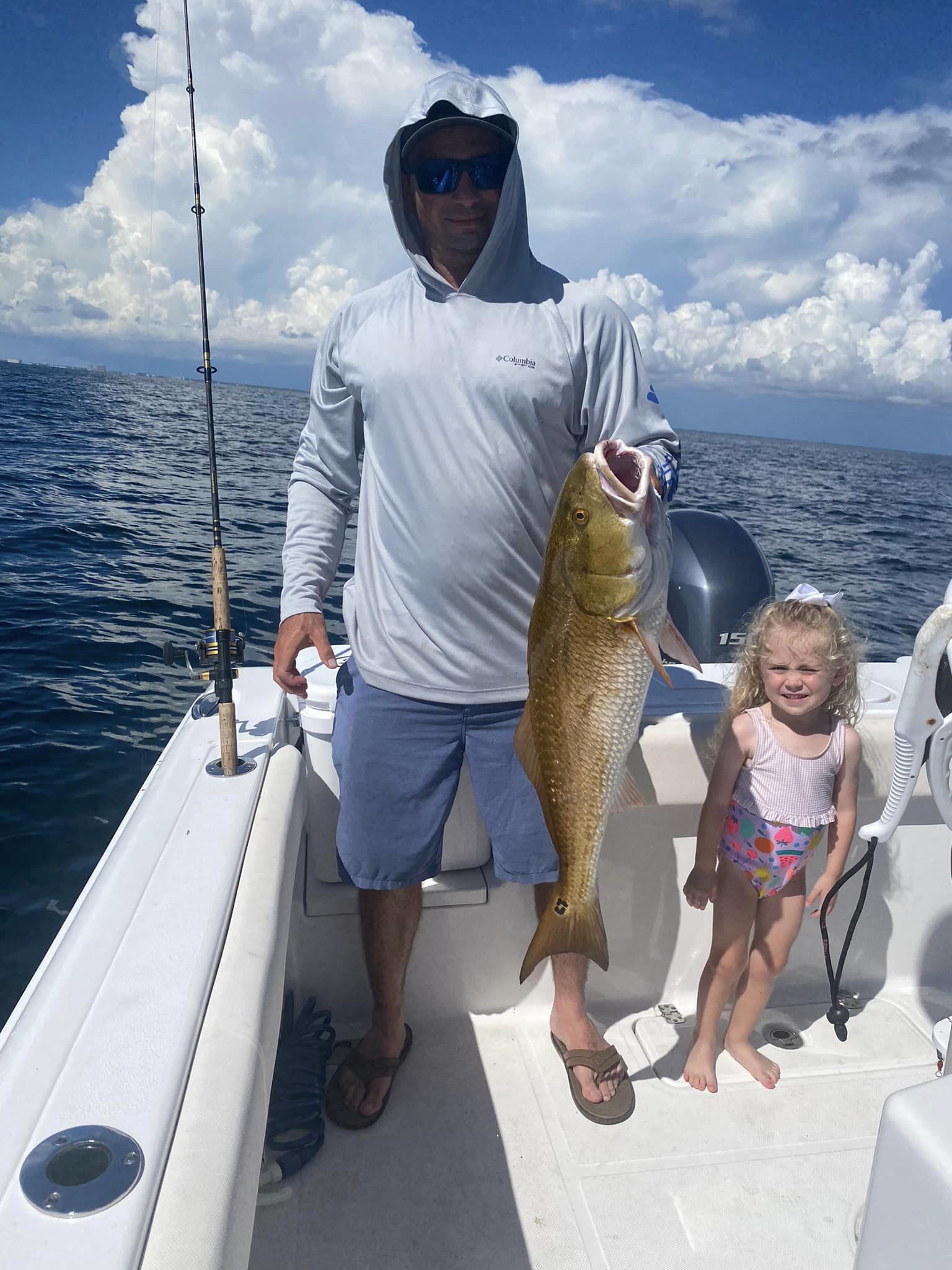2 people fishing in FL with 1 fish