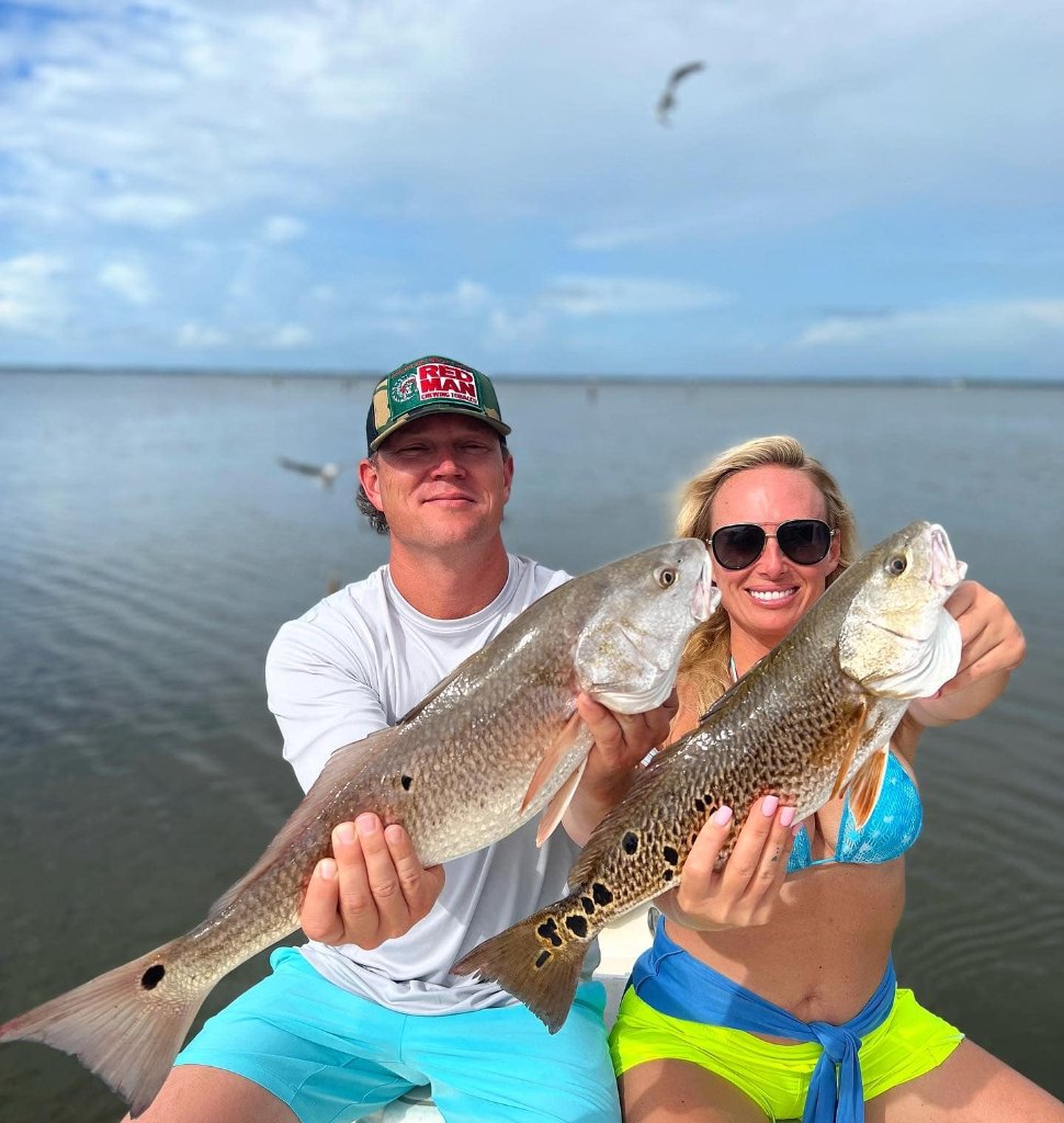 Two redfish, 25 inches, caught at Santa Rosa Beach