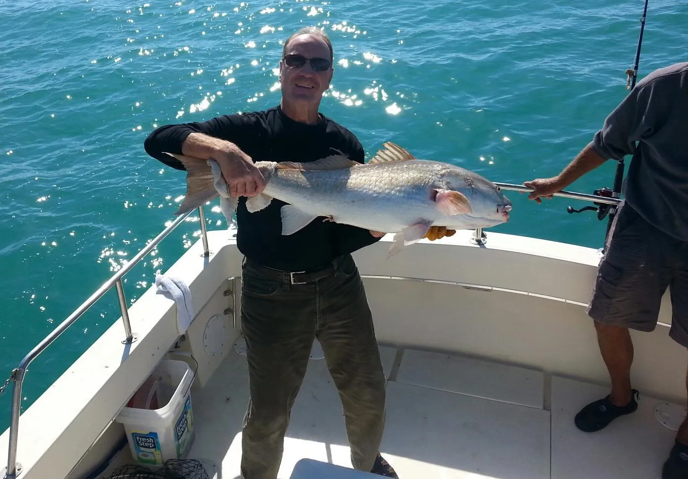 Angler with a 23-inch fish at Fort Myers Beach