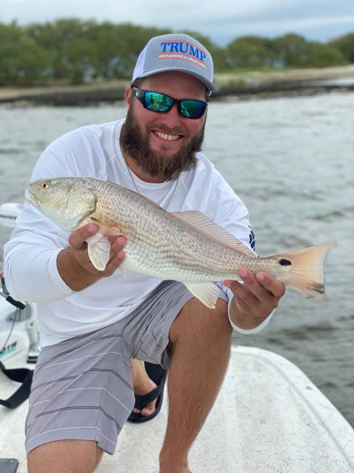 Redfish measuring 18 inches caught at Horseshoe Beach