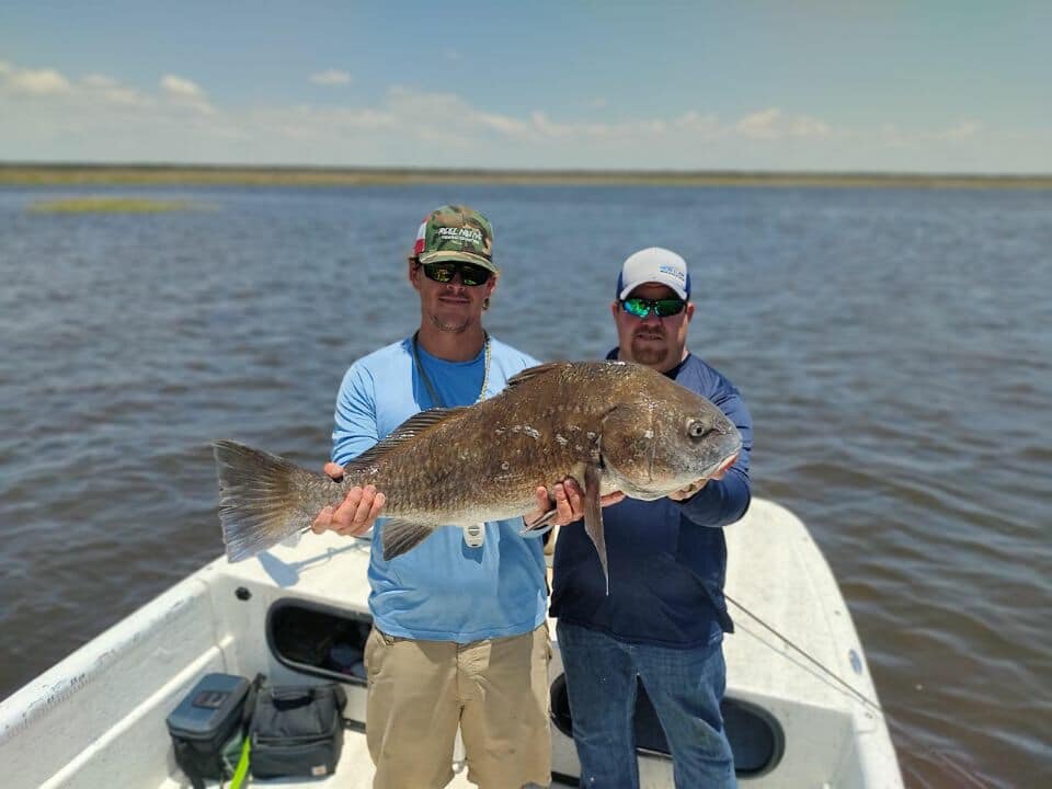 Two people fishing at Horseshoe Beach