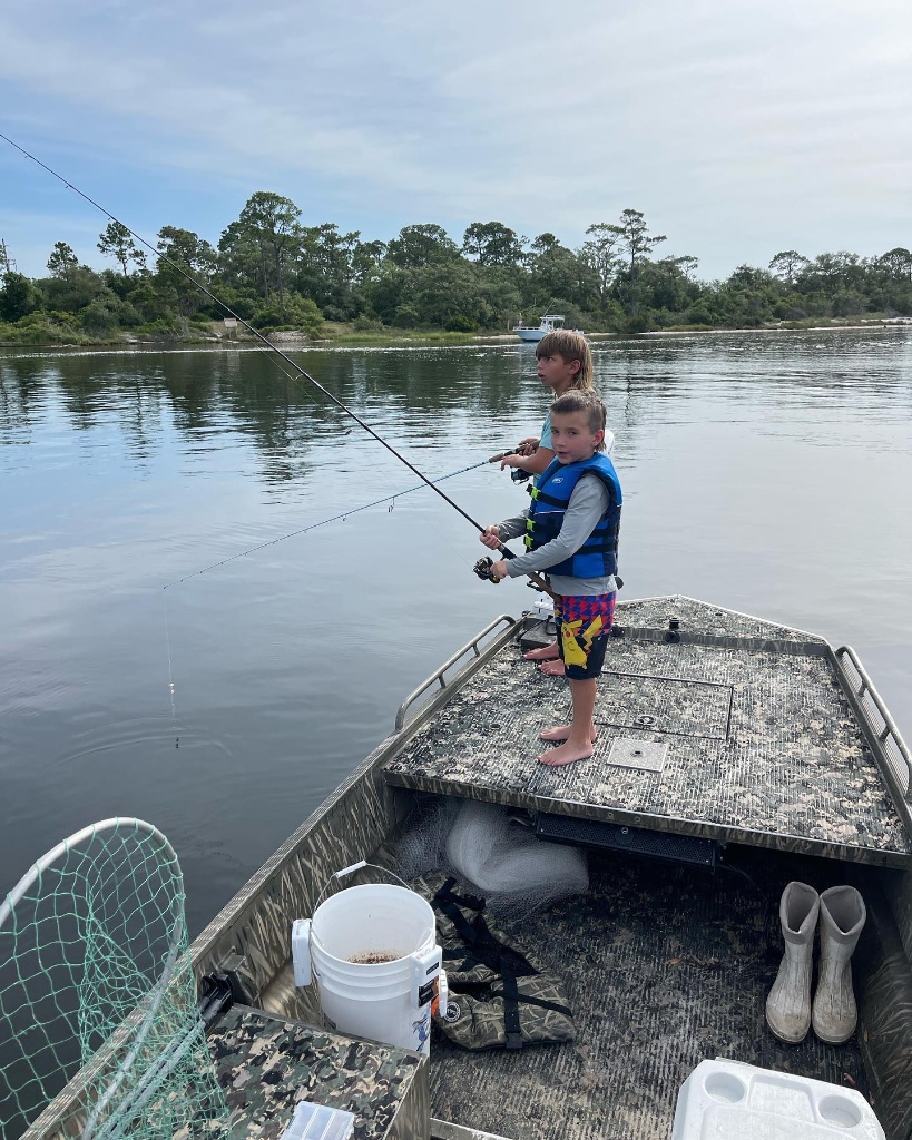 Two people enjoying a fishing trip in Crawfordville