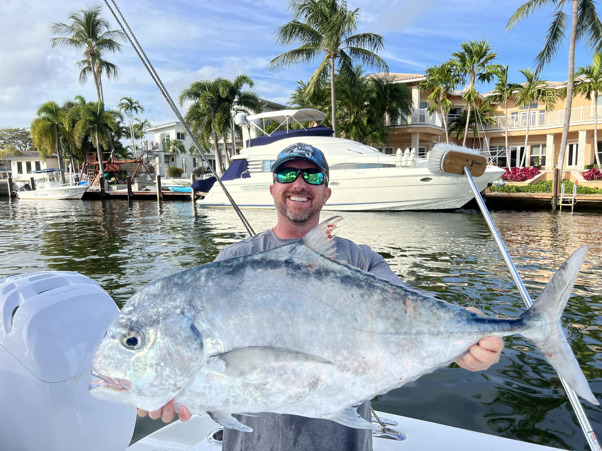 Photograph of a single large African Pompano fish caught while fishing in Deerfield Beach
