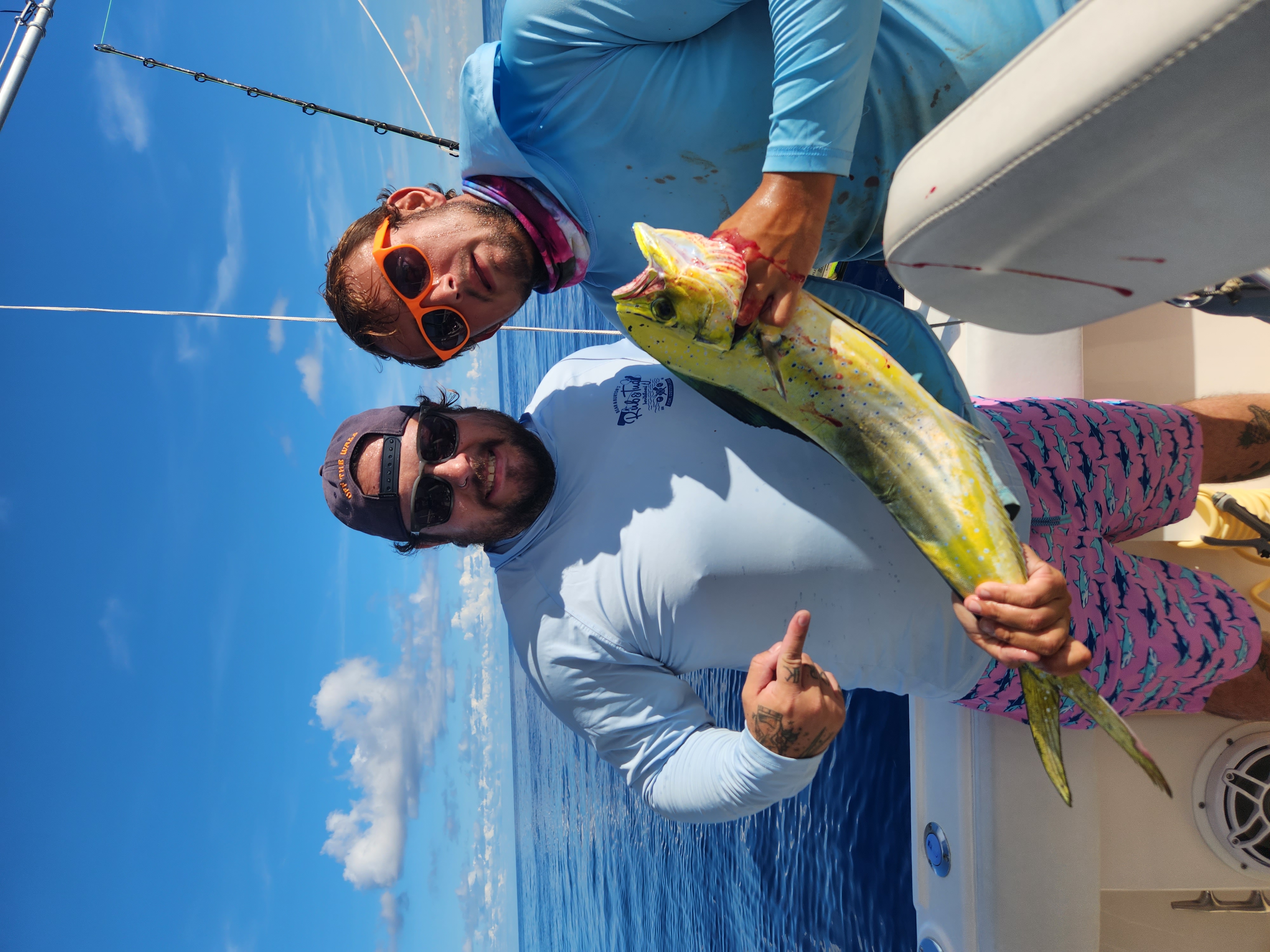 Angler holding a 14-inch fish on Stock Island