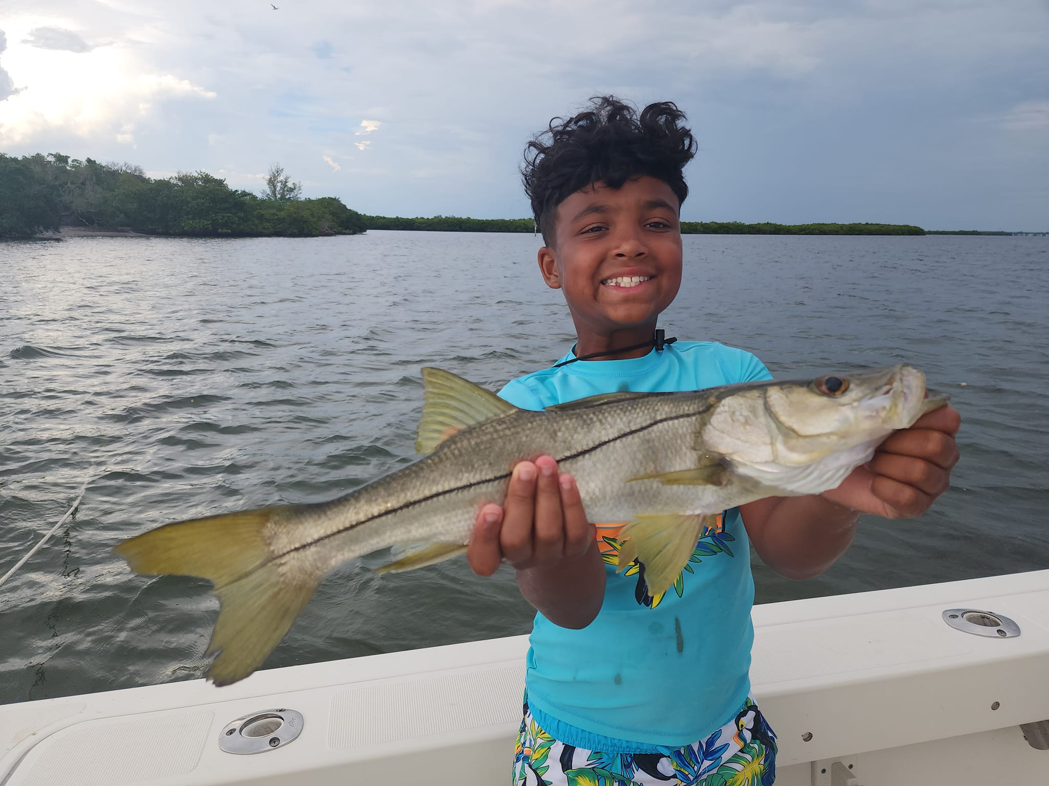 A person fishing for a snook in FL