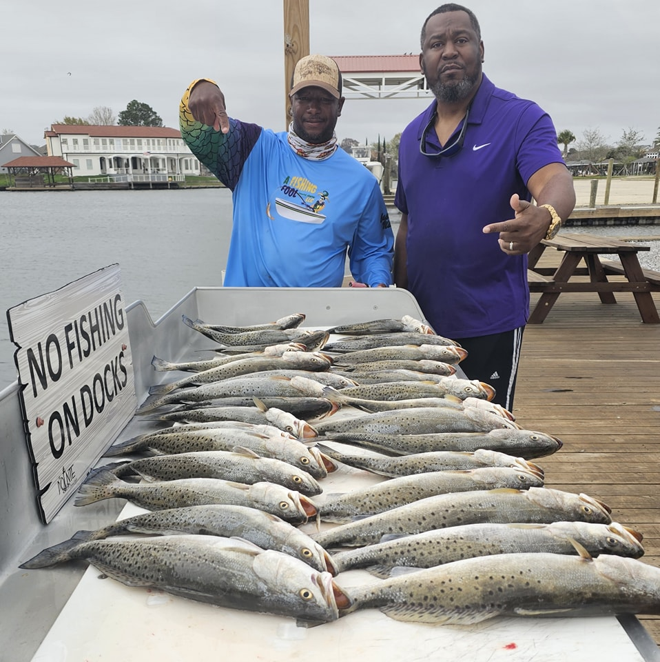 Two anglers with a catch of two big fish in Slidell