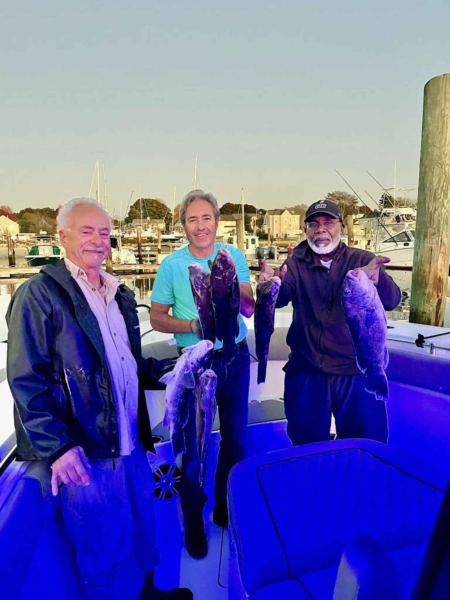 Three people fishing at Fairhaven