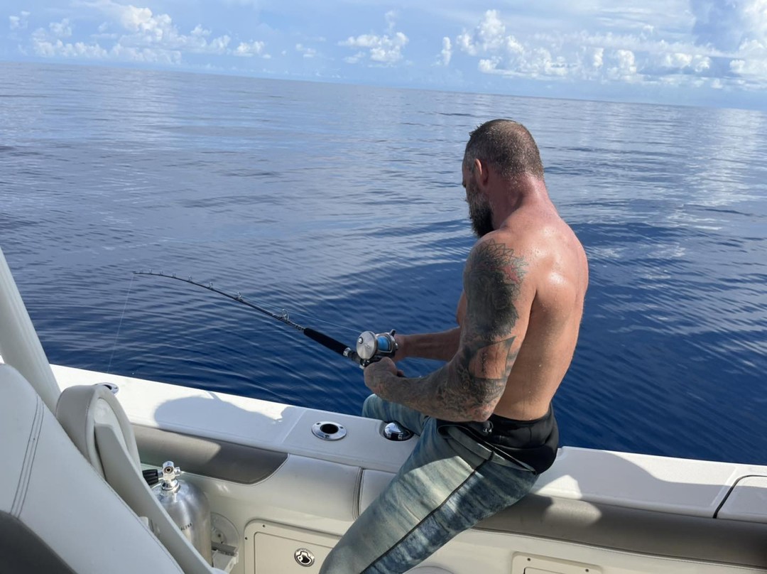 Deep sea fishing from boat in Ocala FL waters with fishing rod