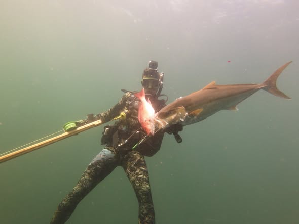 One fisherman with a catch at Shalimar