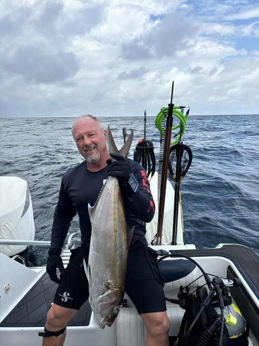 Offshore Gulf spearfishing boat in federal waters near Shalimar FL with spear fishing gear
