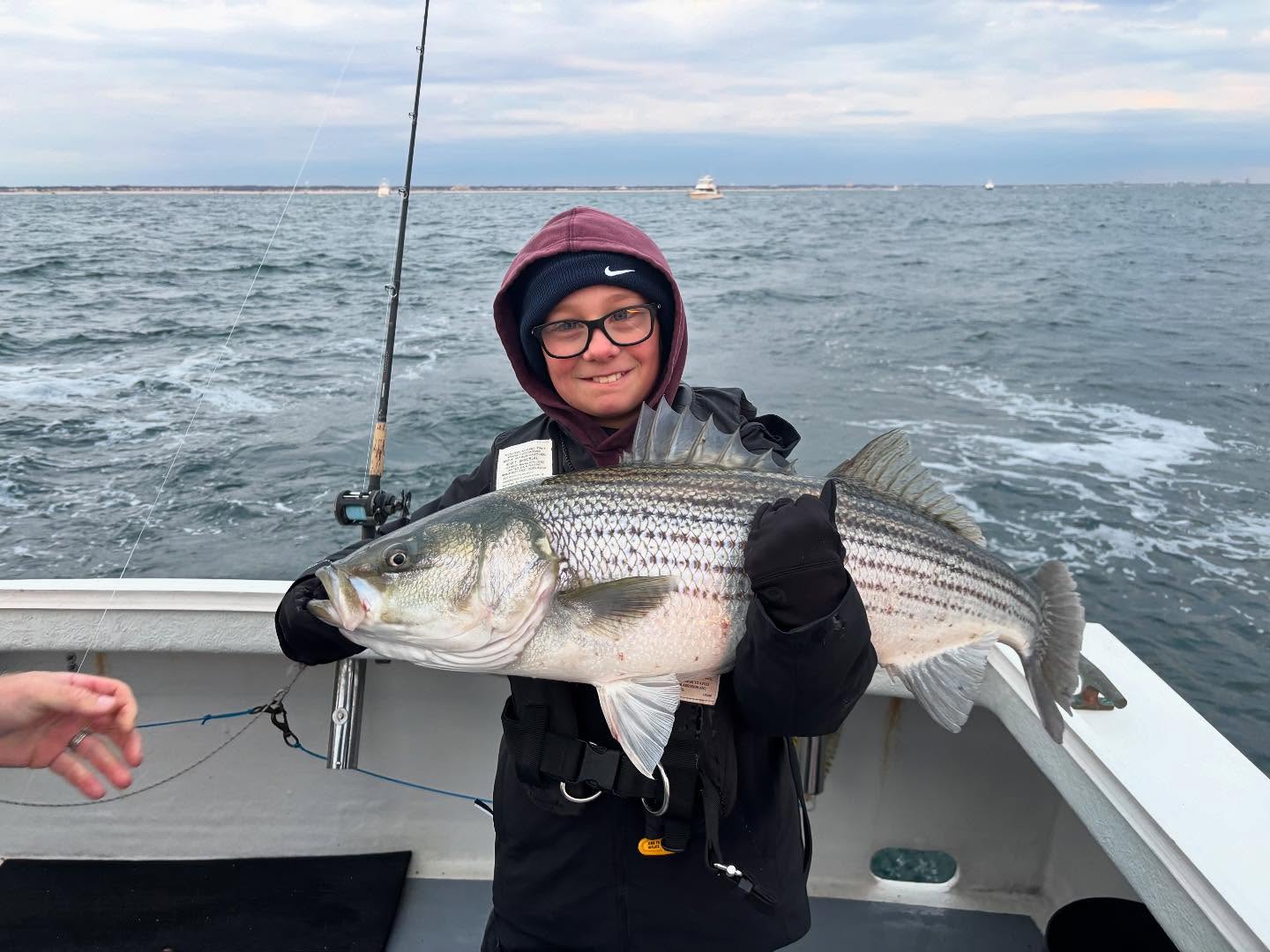 Person fishing in Neptune City