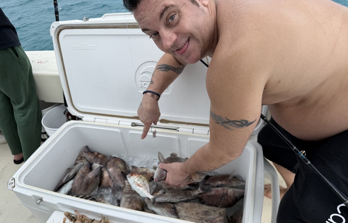 Fishing cooler filled with fresh caught fish on boat in Clearwater FL