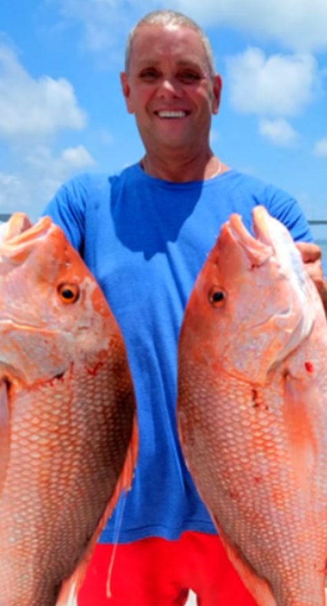Two red snapper fish caught while fishing in Clearwater FL