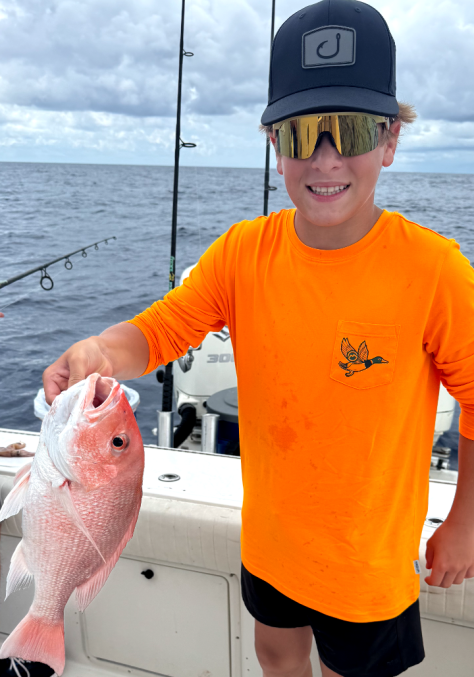 Red snapper fishing charter boat in Clearwater FL Gulf waters with Captain Ron