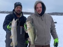 Two anglers fishing in Wisconsin, catching big fish