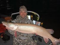 Angler fishing in Wisconsin with a 38-inch catch