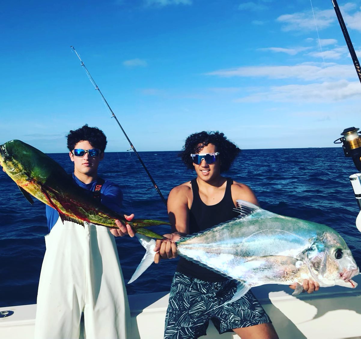 Two African Pompano fish caught while fishing in Miami