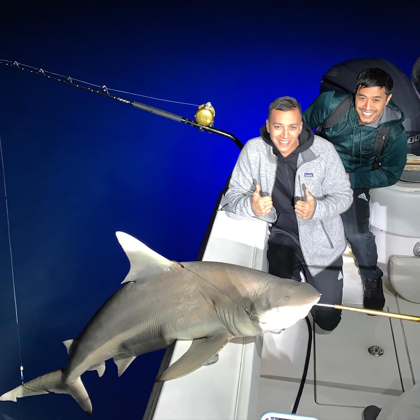 Miami inshore shark fishing charter boat in calm protected waters with fishing gear