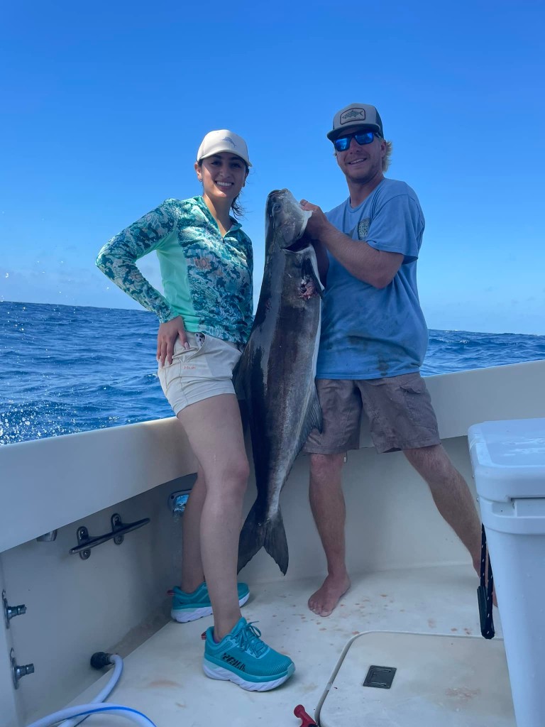 Two anglers with a big fish in Texas