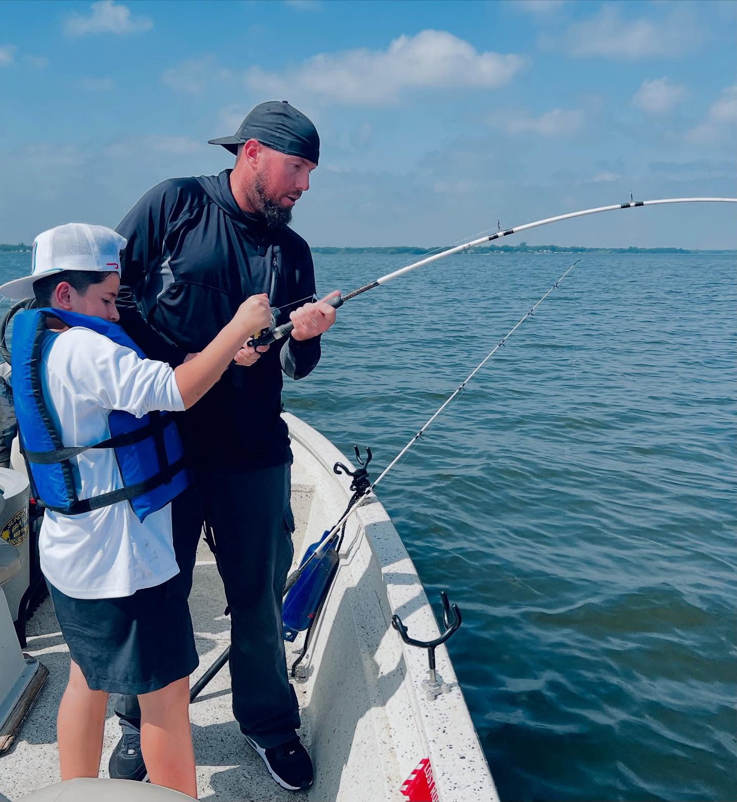 Two people fishing in TX