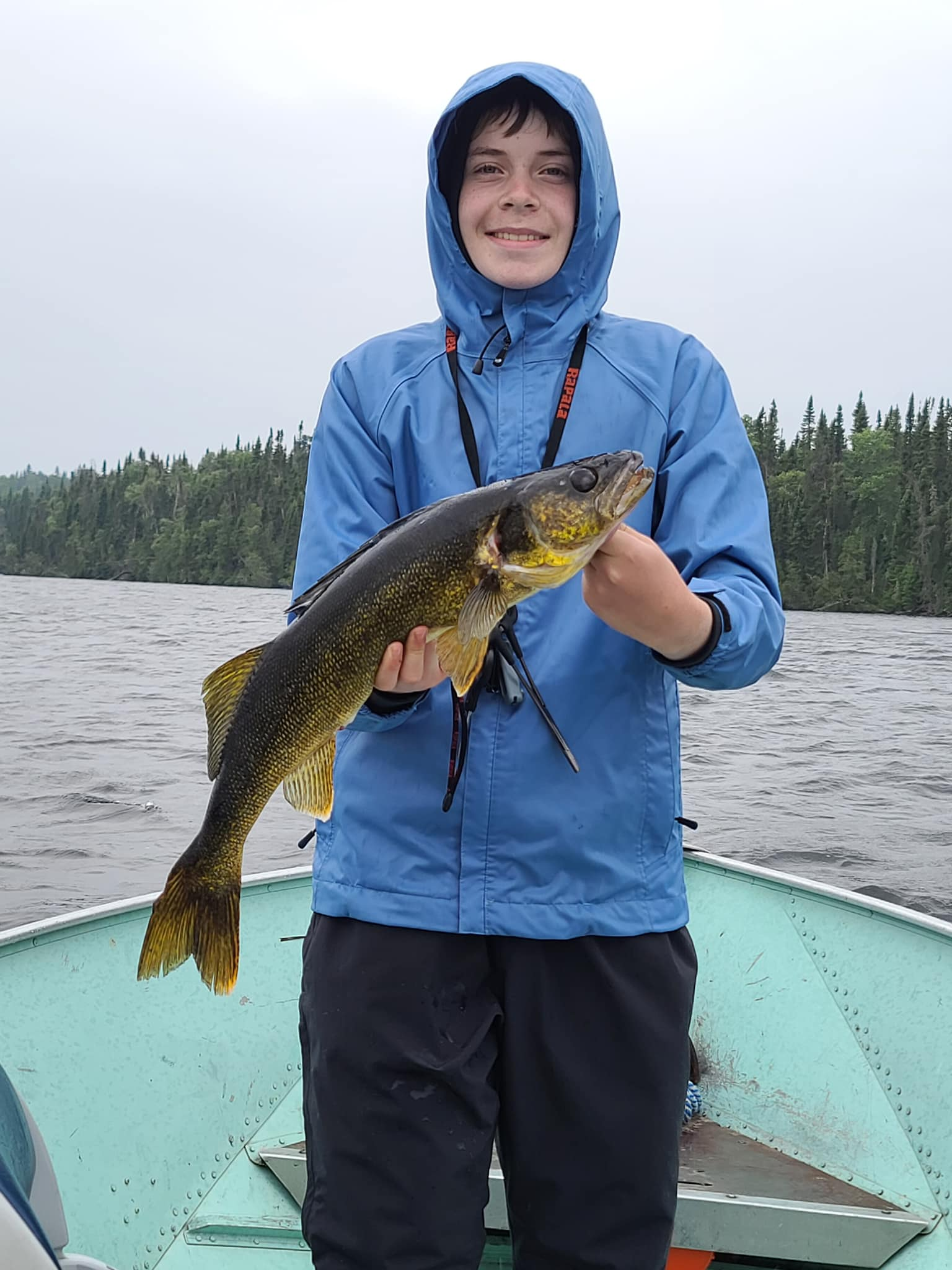 A lone angler at Savant Lake, fishing and hunting