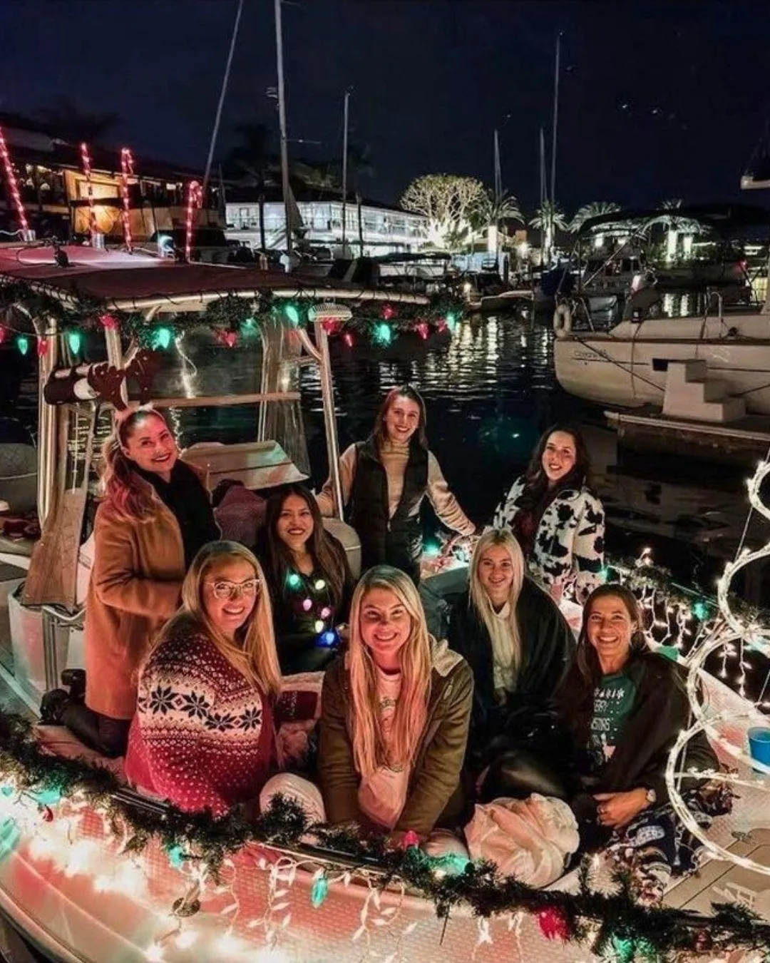 Group of 8 friends enjoying a fishing trip in Huntington Beach