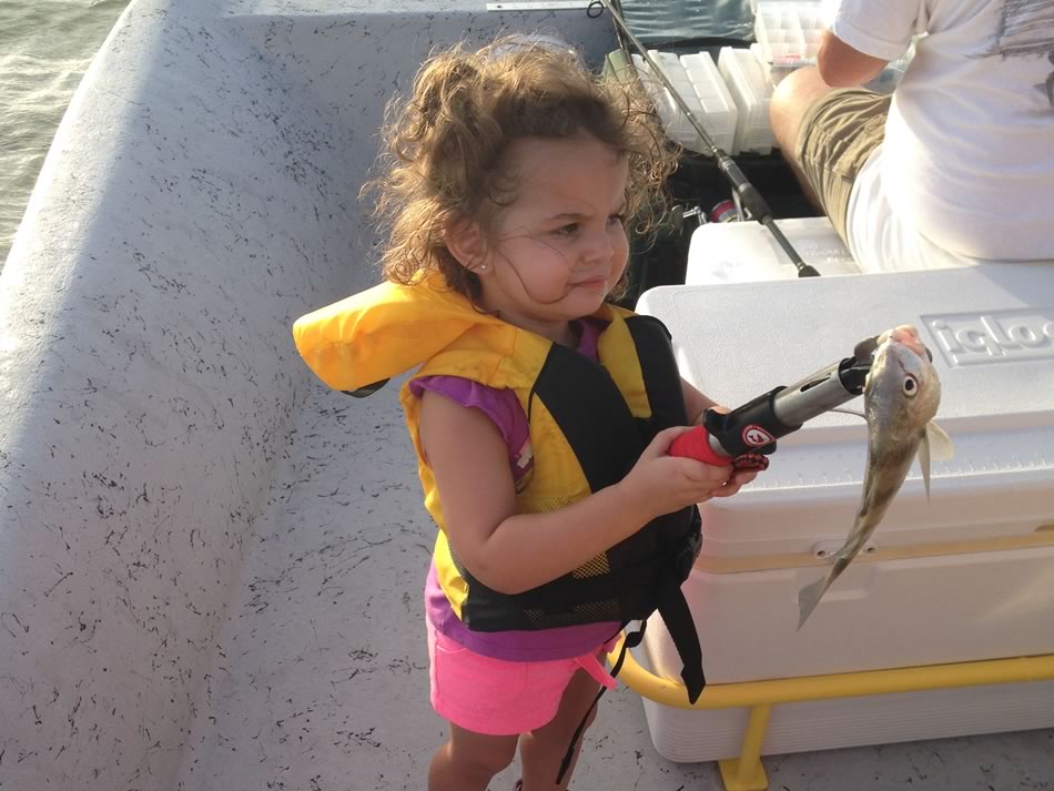 Angler with a fish in Rockport
