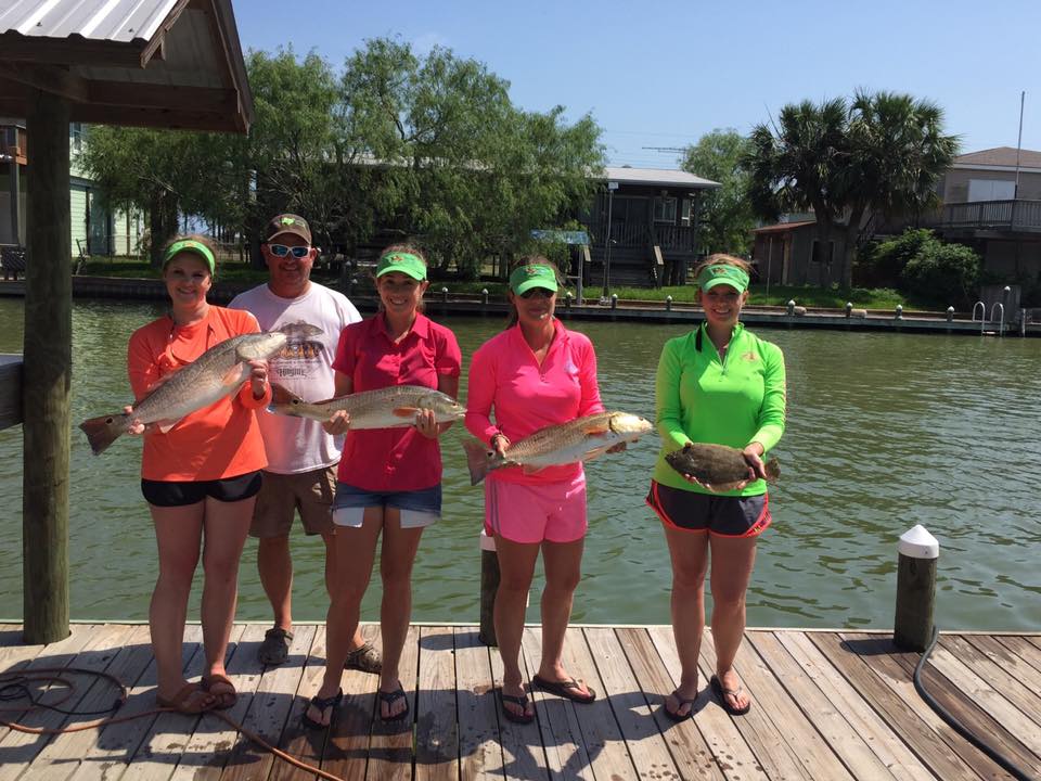 5 people catching 3 big fish in Rockport
