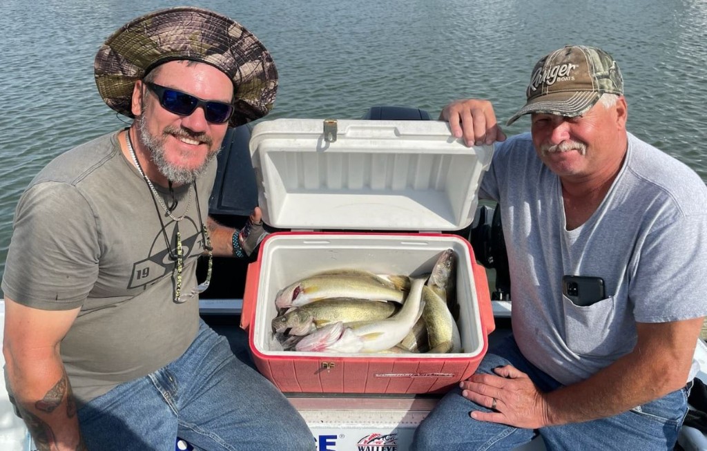 Anglers holding fishing gear in Ohio