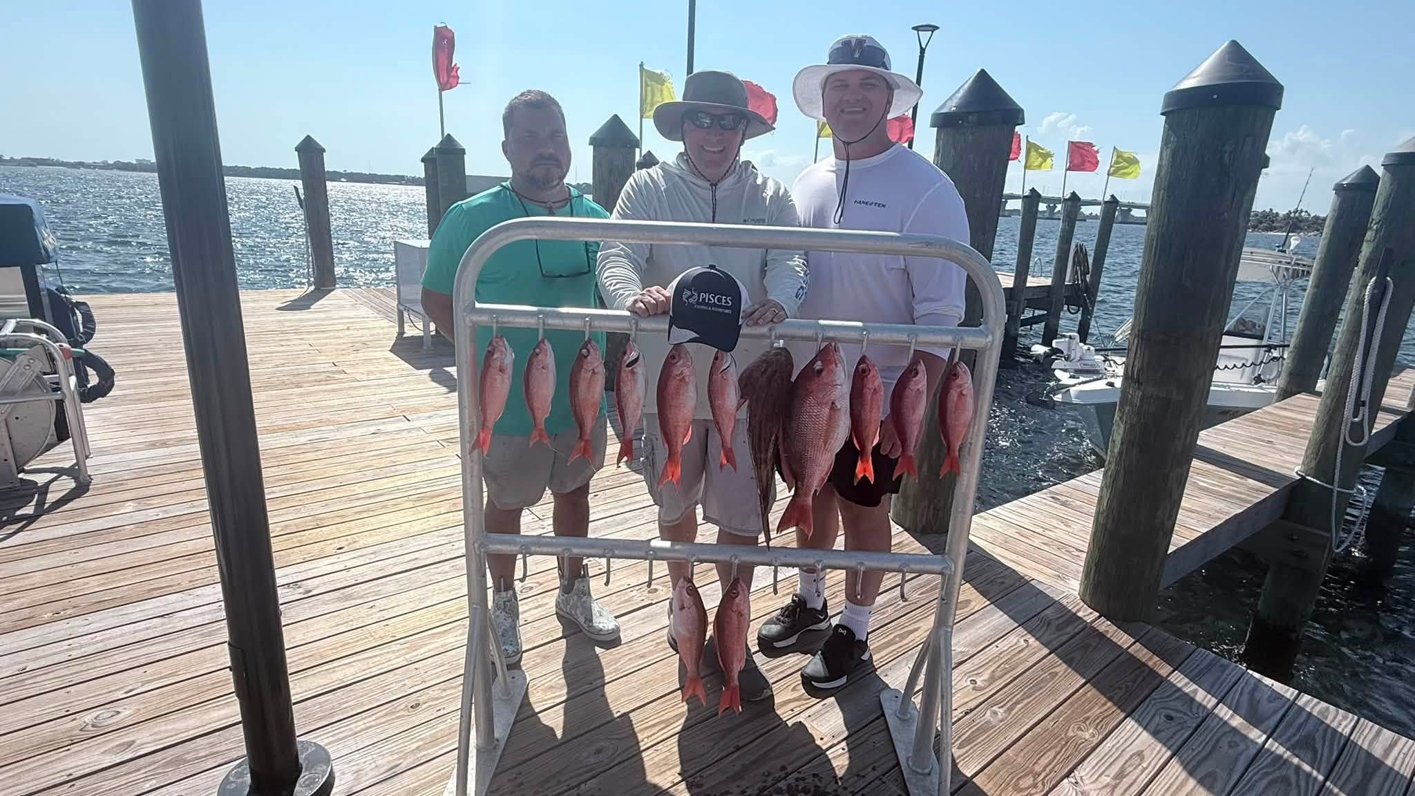 Fresh caught red snapper displayed on fishing charter dock in Panama City FL