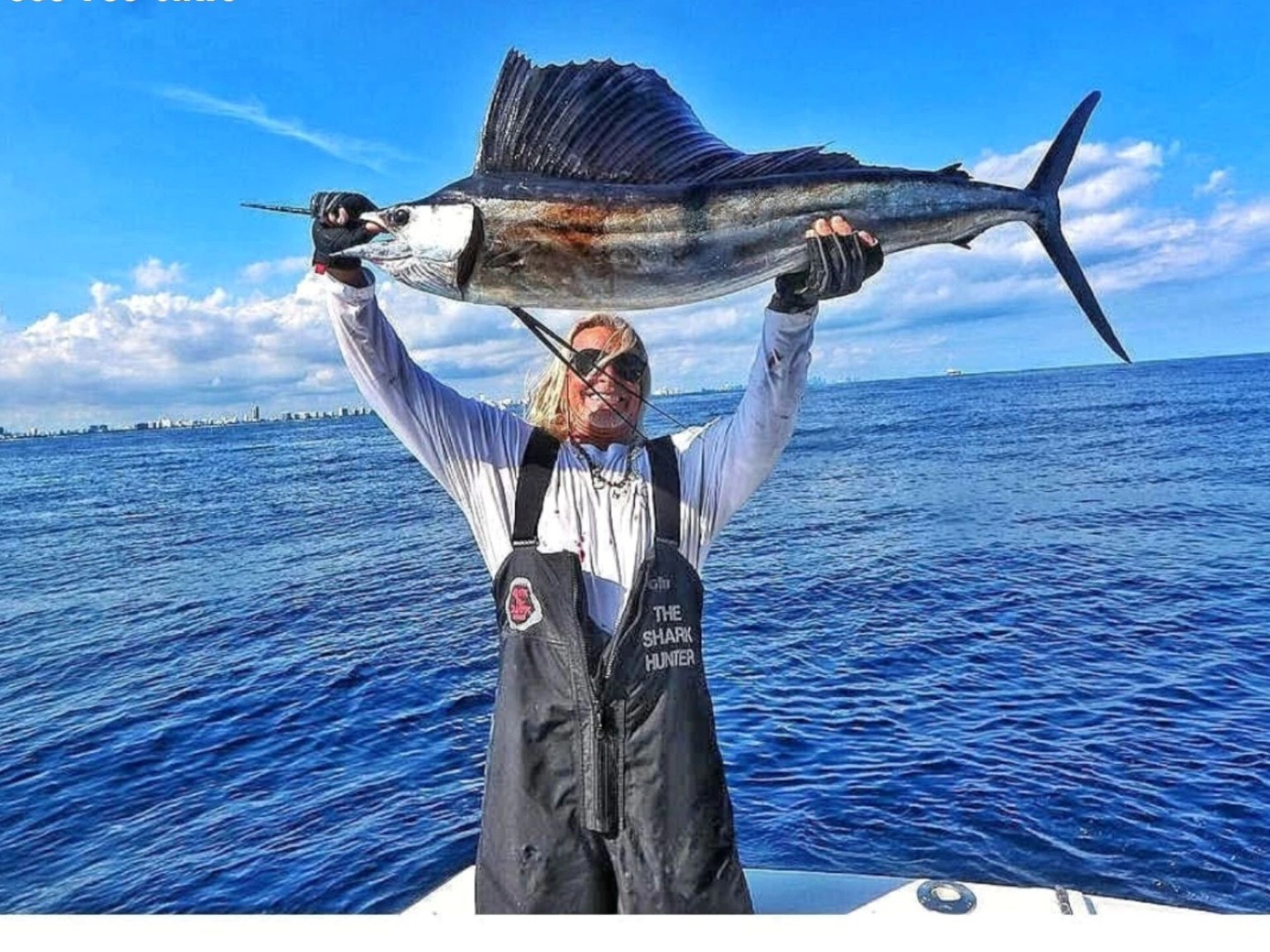 South Florida offshore fishing charter boat with fishing gear ready for 8-hour deep sea trip