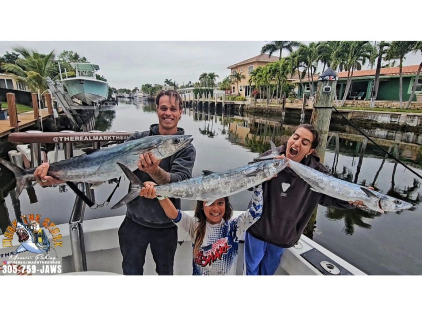 South Florida offshore fishing charter boat with couples on deck targeting deep sea fish