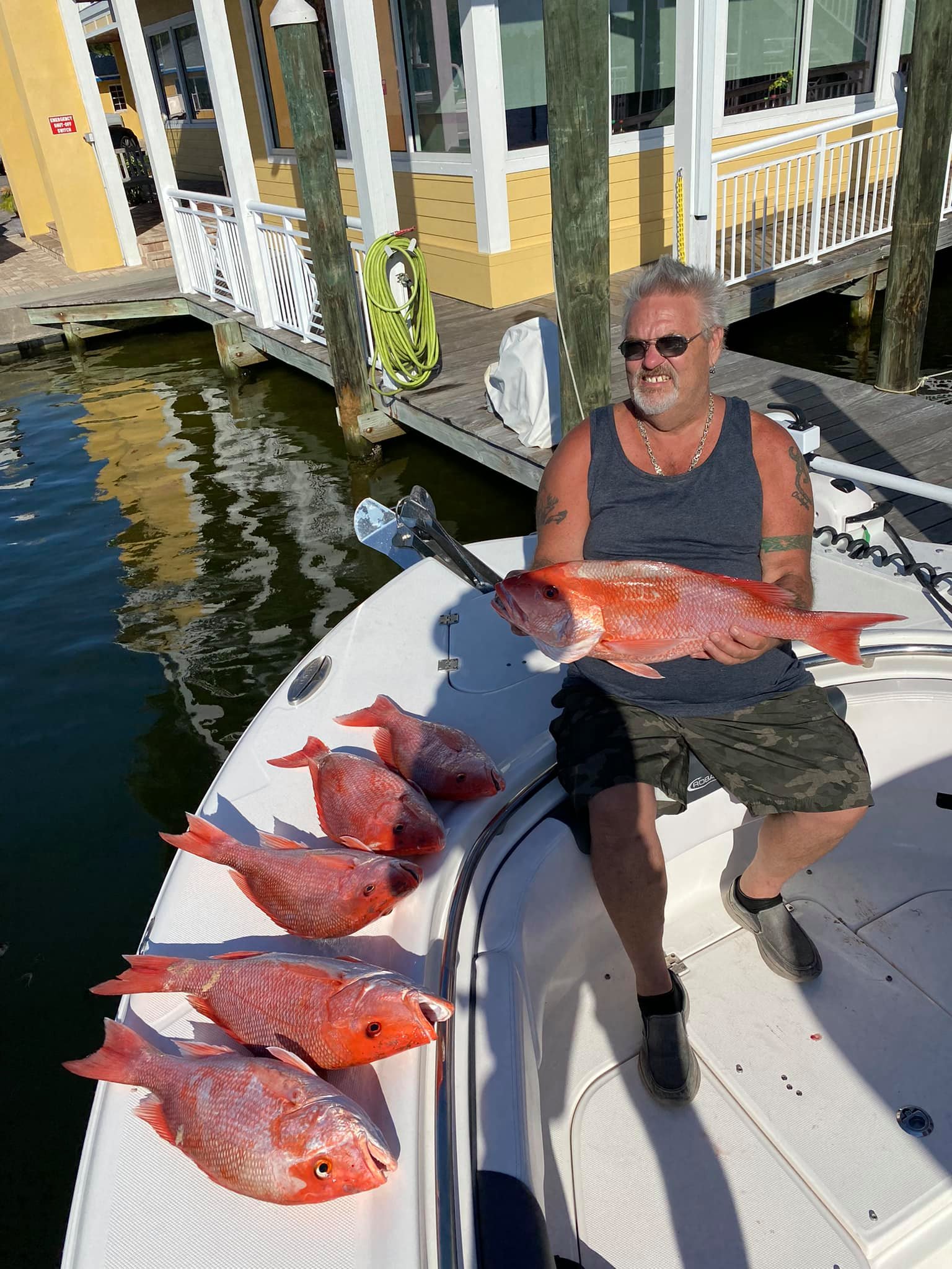 Two big red grouper fish caught while fishing in FL