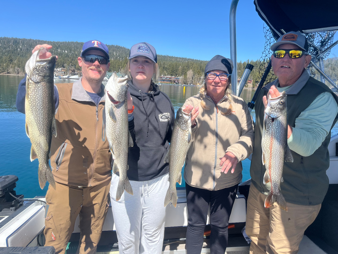 Four large lake trout caught while fishing in CA