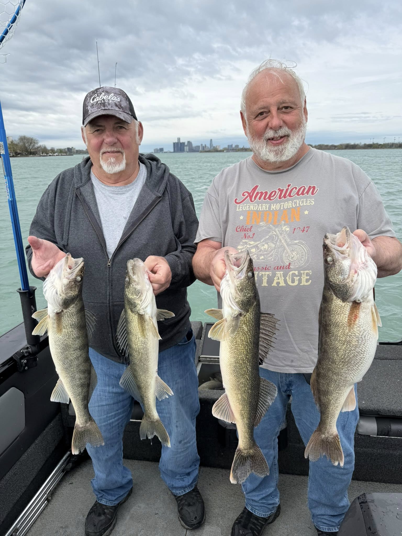 Four walleye caught fishing in Detroit MI displayed on boat deck