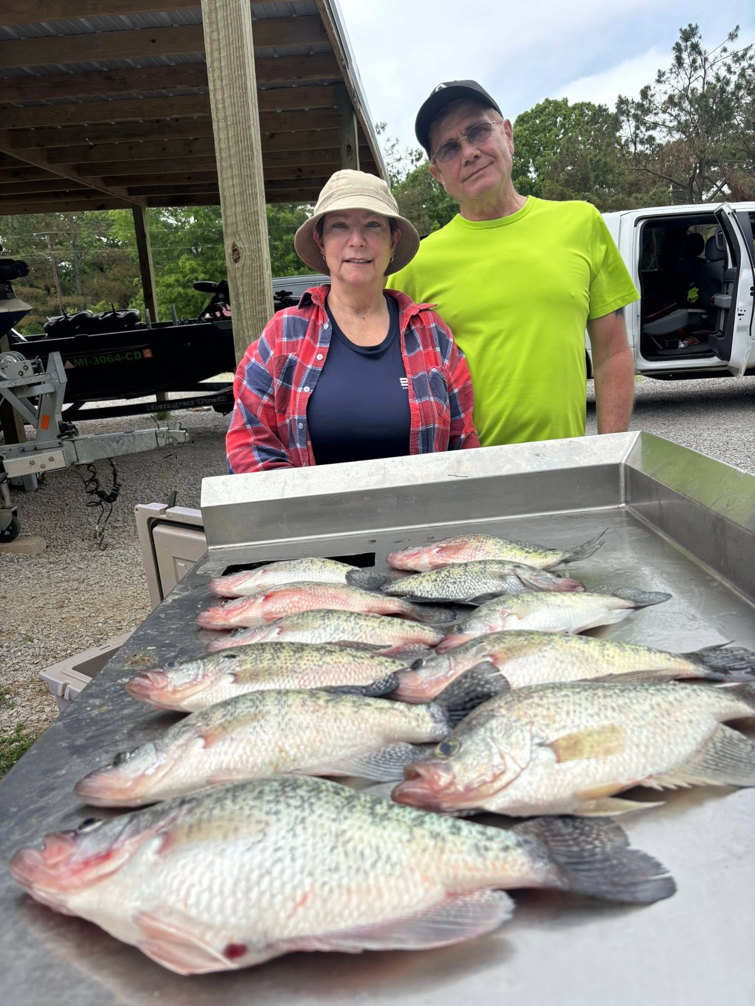Successful crappie fishing catch displayed on cleaning table in Batesville MS