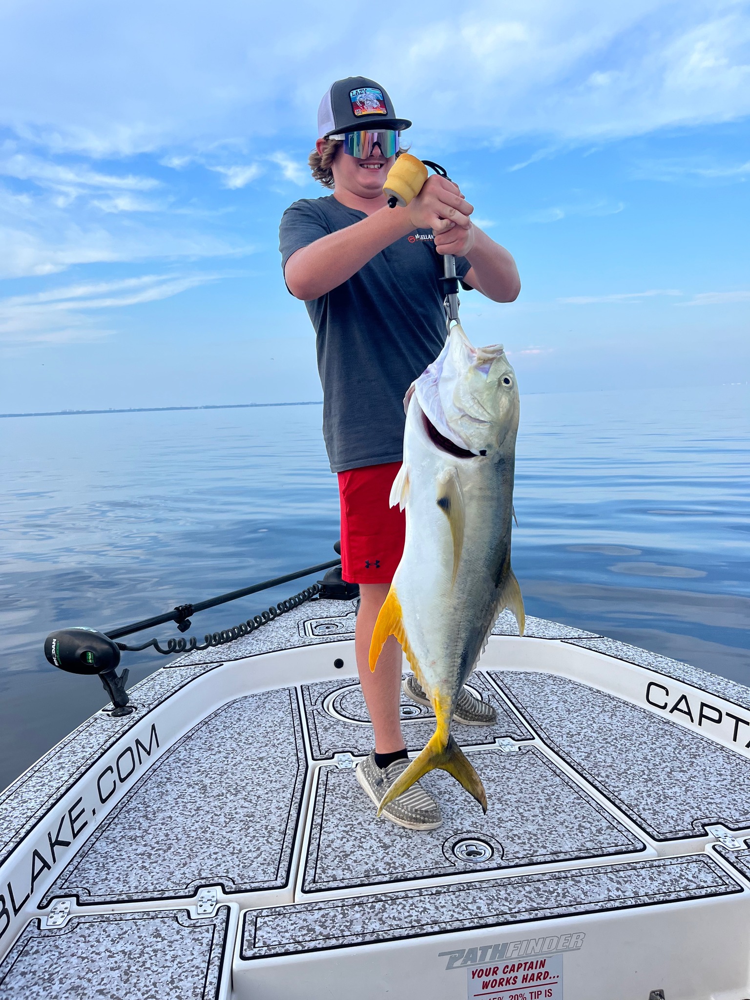 Angler holding a 34-inch fish in FL