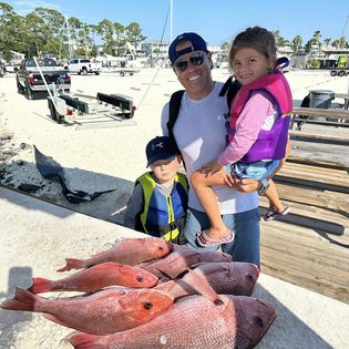 Fishing at Orange Beach with 3 people