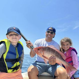 3 people fishing at Orange Beach