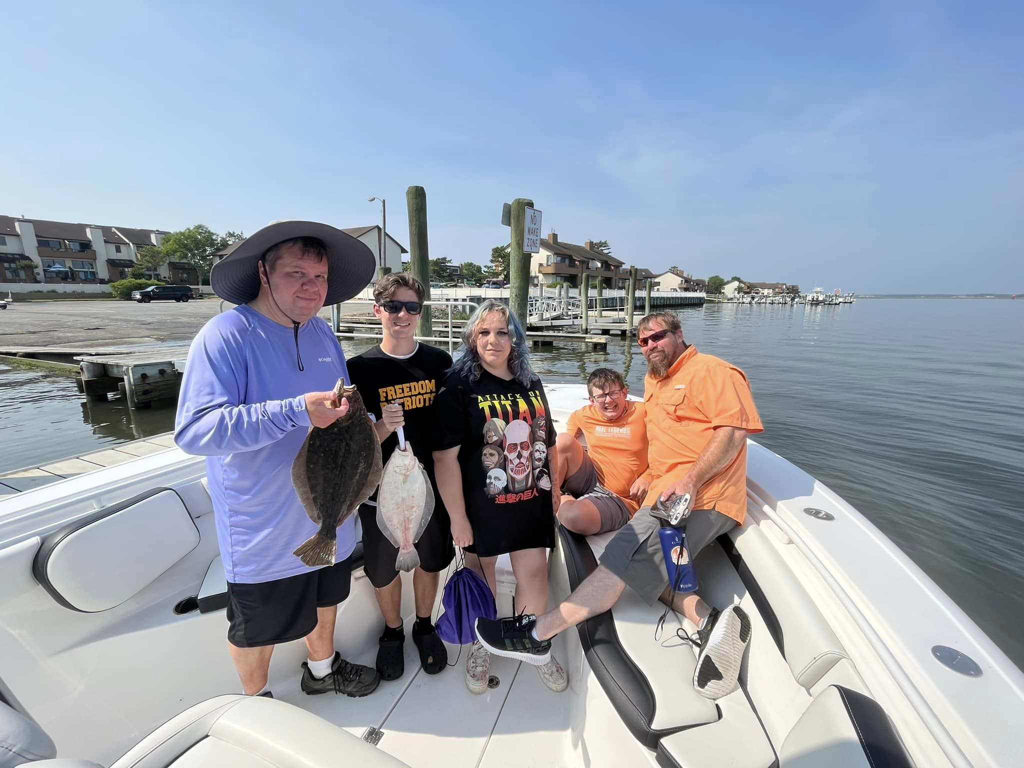 6 people fishing in the ocean at Ocean City