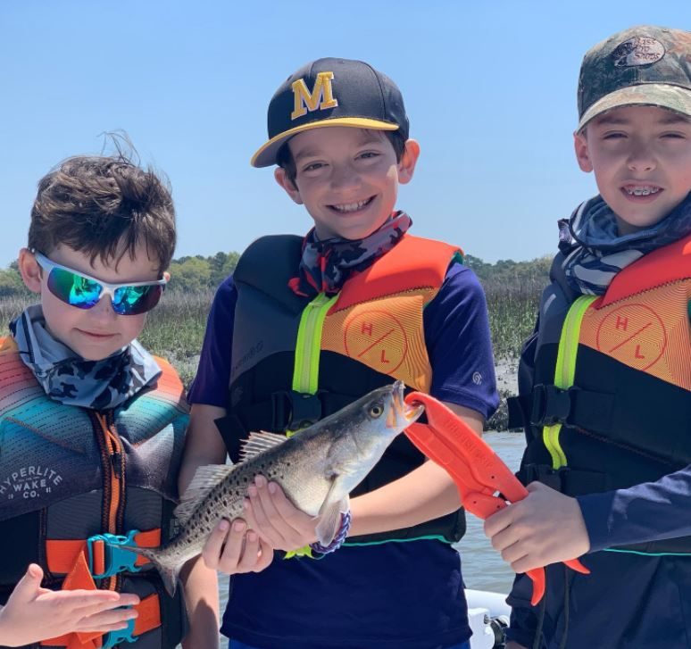 3 people fishing at a scenic location in SC