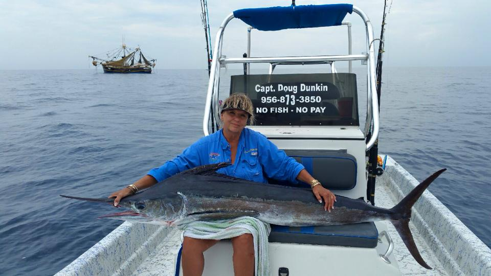 Impressive catch of a massive blue marlin fish during a fishing hunt