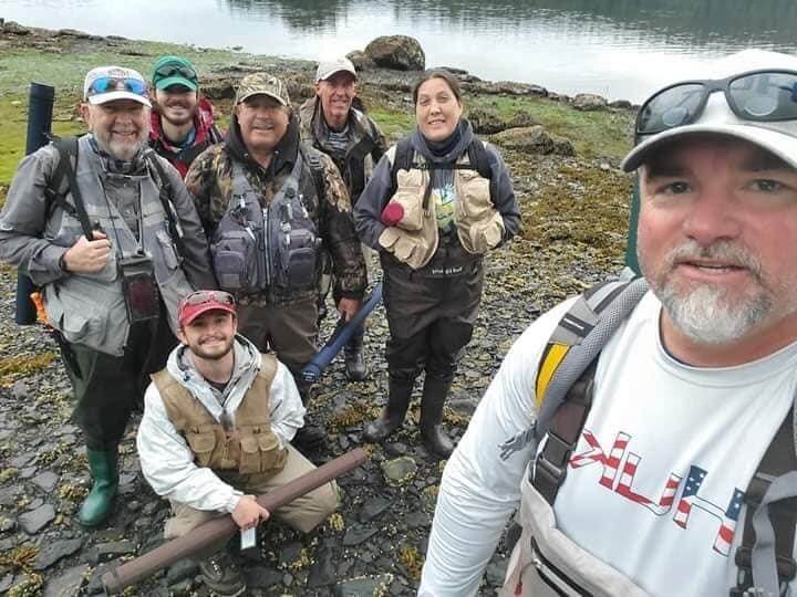 Group of 7 people fishing in Alaska