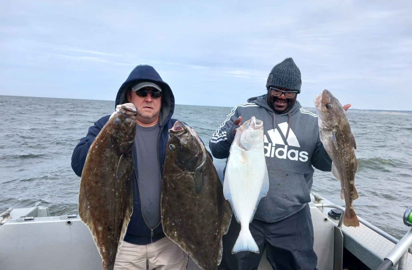4 huge Pacific Halibut caught fishing in AK
