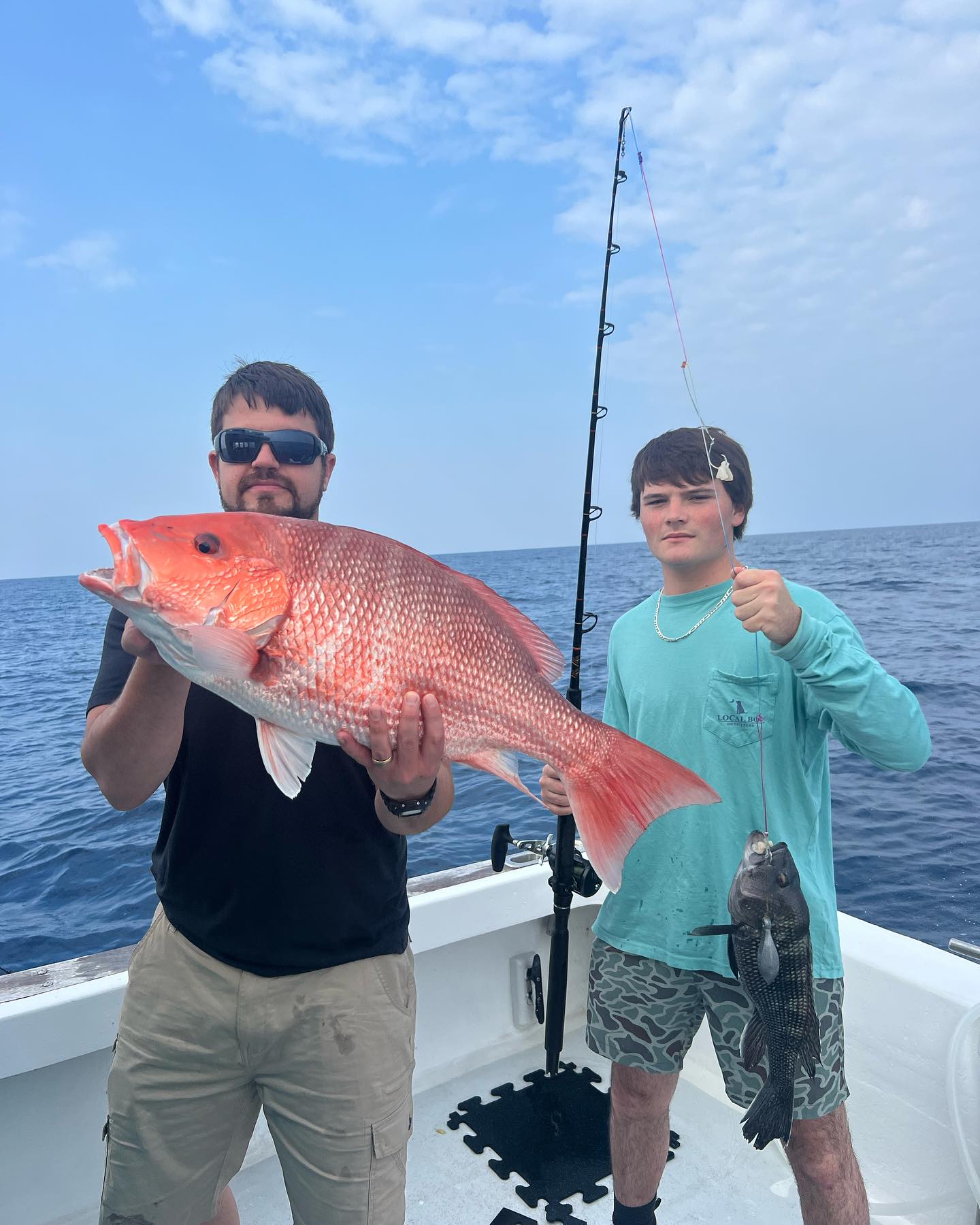 Two anglers with big 26-inch fish at Little River