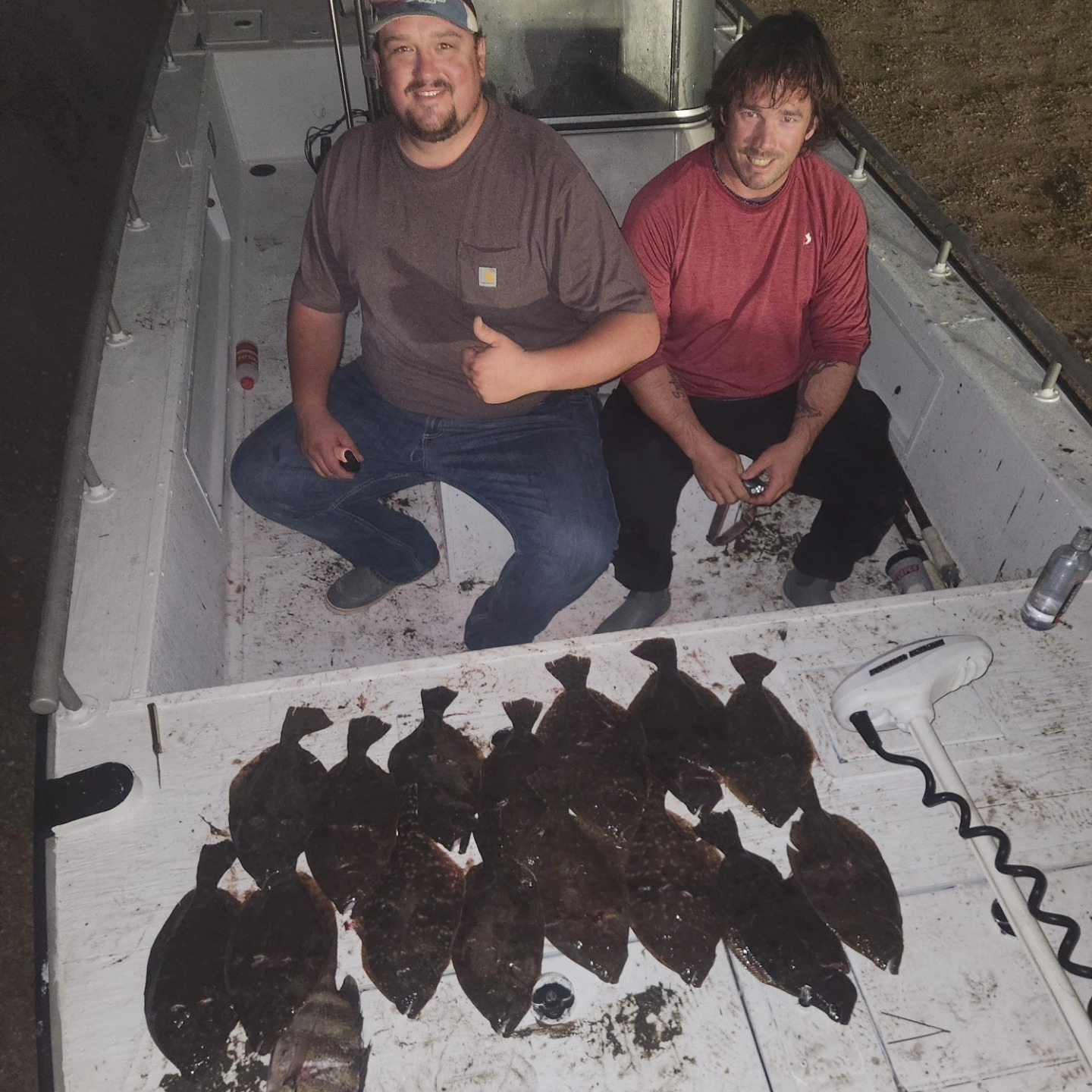 Pensacola night fishing trip aboard Kencraft boat with Captain Tim at lighted docks and bridges