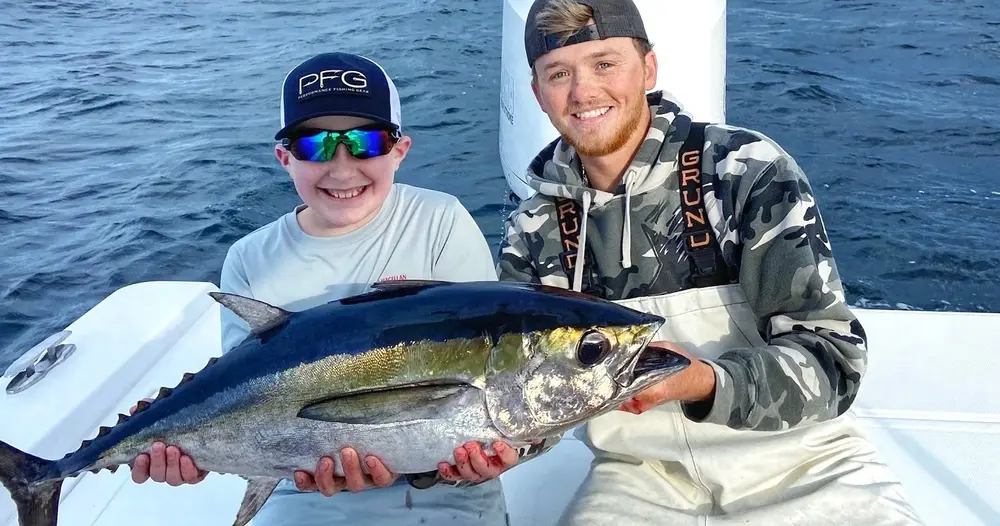 Offshore fishing boat with anglers on Gulf waters near Pensacola, Florida