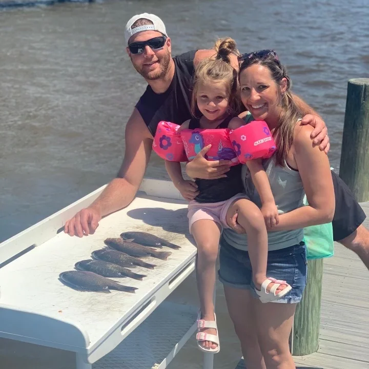 Three people enjoying a fishing cruise in FL