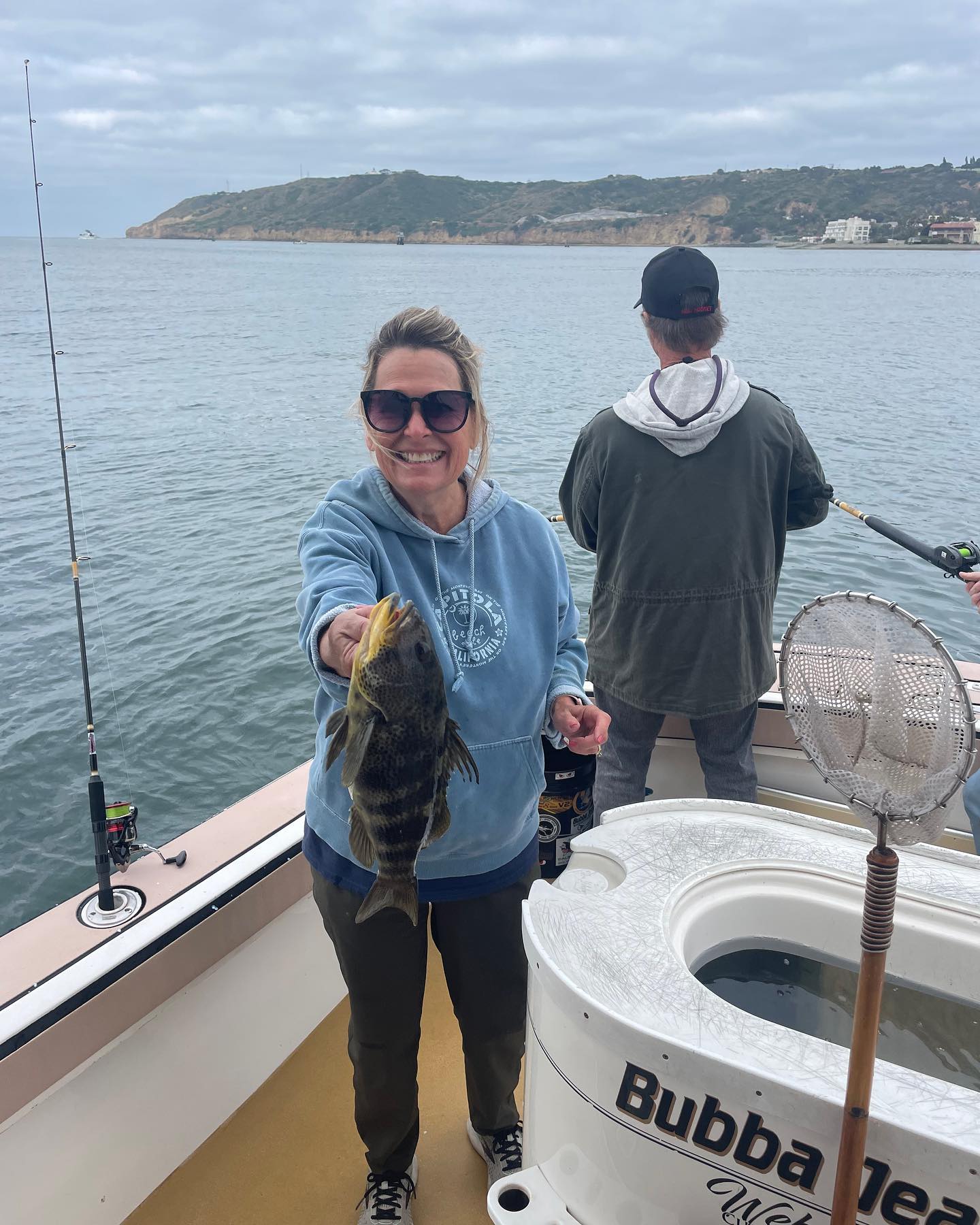 Man and woman fishing in San Diego