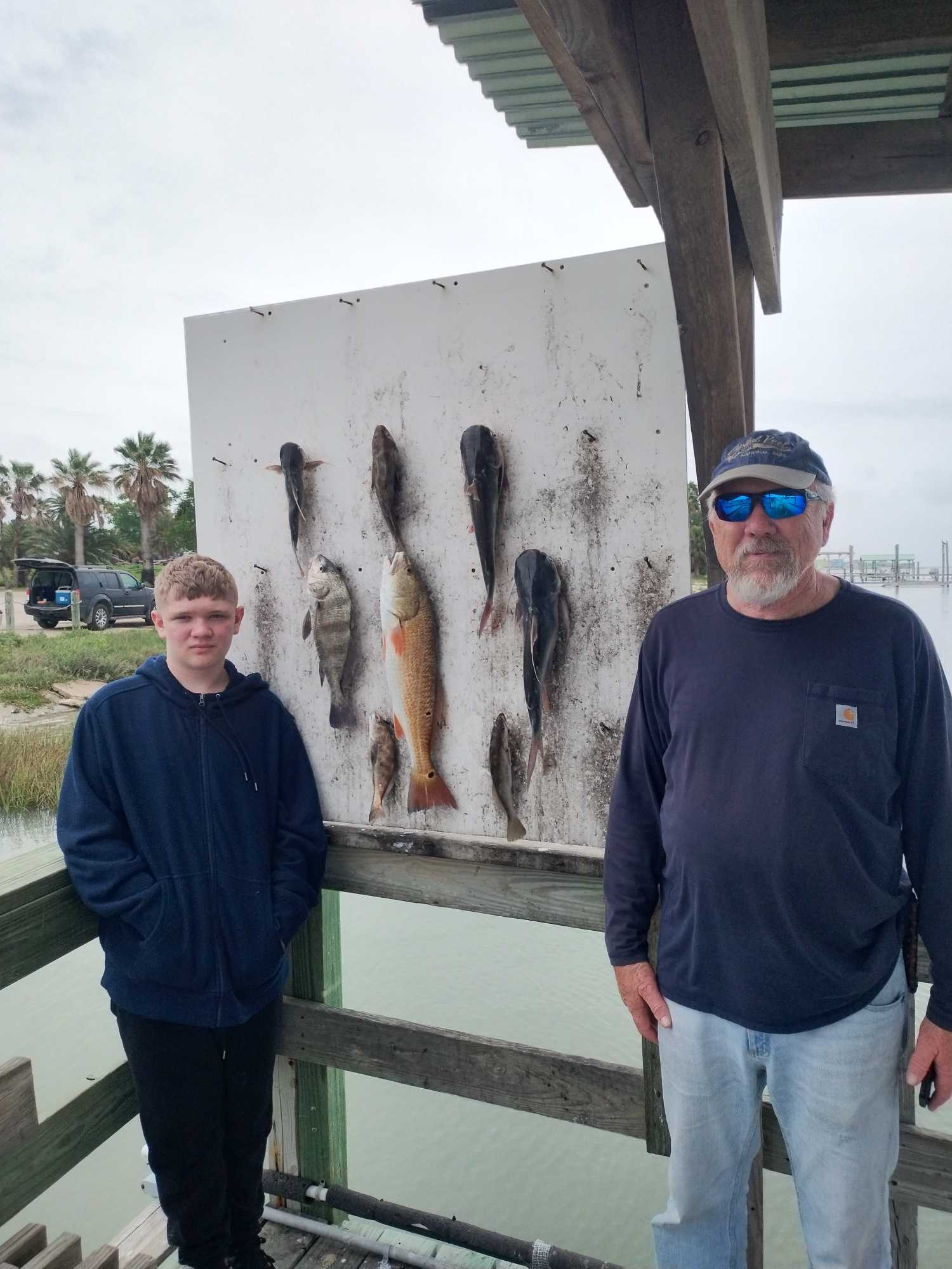 Fresh caught redfish displayed on cleaning station after successful fishing trip in Corpus Christi TX